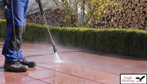 Professionals are accomplishing the task of pressure washing